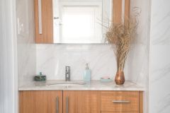 Oak-vanity-with-wall-panel-Mt-Pleasant